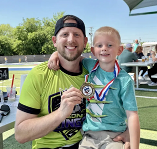 Tyler Bull, owner of No Bull Home Services in Hewitt, Texas, with his son after a soccer game